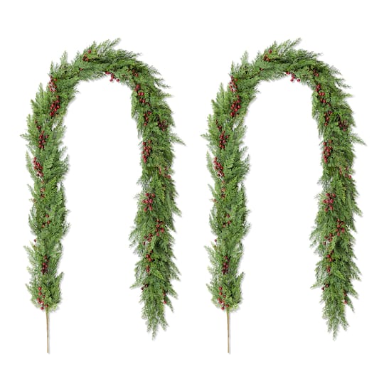 Glitzhome® 9ft. Christmas Greenery PE Dripping Cedar Garland with Red Berries, Set of 2